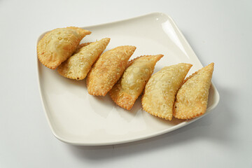 Pastel or Jalangkote Traditional Food From Makassar Indonesia, Filled with Carrots, Potatoes, Sweet Potatoes and Eggs.