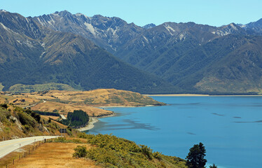 Mountains and scenic road on Hawea Lake - New Zealand