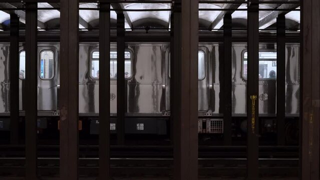 Subway Train departing in Station at 23rd Street in NYC. MTA Mass Transit Authority