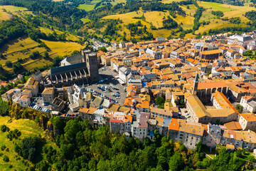 Aerial view of French commune of Saint-Flour on summer day looking out over ancient Gothic cathedral, Auvergne..