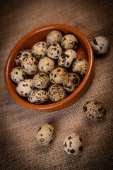 Fresh Quail eggs on background, Food and health concept