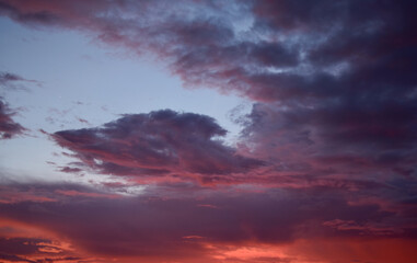 colorful clouds, sky and clouds in shades of purple, red, lilac, aquamarine.