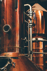 close up of copper whiskey still	