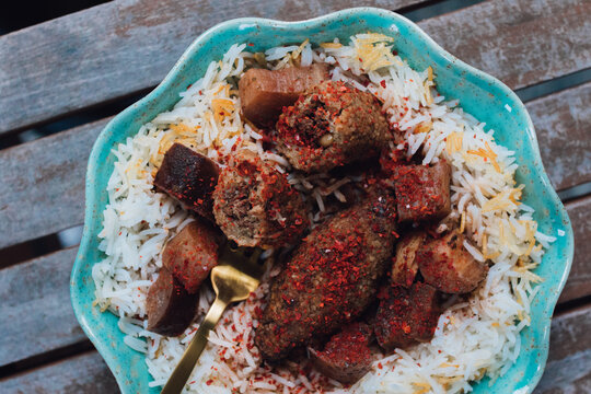 Kibbe Summaqiyeh, kibbeh in sumac stock, meatball recipe from Aleppo