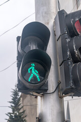 Green pedestrian traffic light in Georgia country.