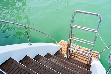 Ladder stairs wooden on yacht.