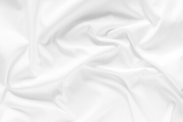 Obraz premium White fabric texture background. Cloth soft wave. Creases of satin, silk, and cotton.