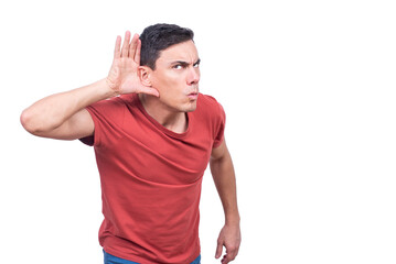 Man eavesdropping with suspicious face in light studio