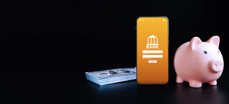 Mobile banking. Smartphone with internet online bank application. Usd money cash on black background. Save money business concept. - Powered by Adobe