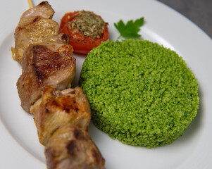 Lamb brochette marinated in spices, green semolina, hight quality photo