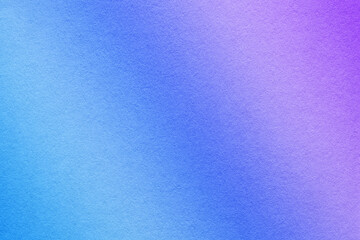 Texture of old blue and purple paper background, with holographic gradient, macro. Structure of violet craft cardboard