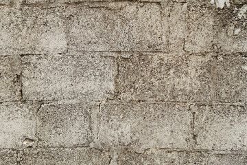 Partially rough surface of cement brick wall