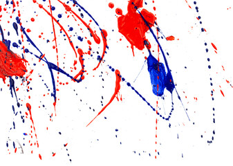 Drops of red and blue paint on a white background.