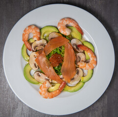 Healthy breakfast with salmon, salad, avocado mushroom, salmon egg, red onion, High quality photo