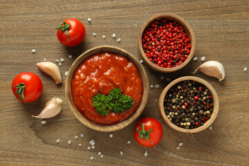 Concept of spicy sauce with Adjika, top view