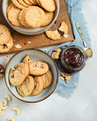 Delicious oat cookies on light background.