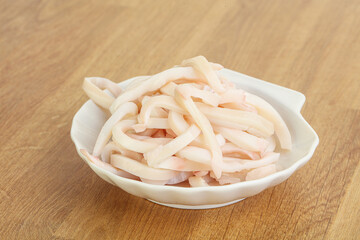 Marinated squid strips in the bowl