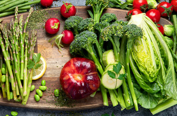 Delicious raw fruits and vegetables on  background.