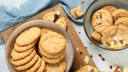 Delicious oat cookies on light background.