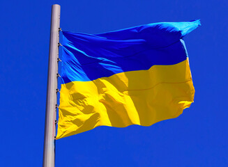 flag of Ukraine against bright blue sky