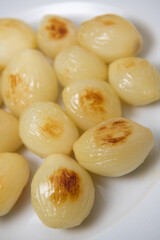 Preparing fresh white onions cooked on plate, High quality photo