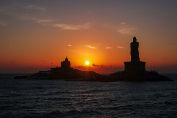 Sunset view point Vivekananda rock memorial AND Thiruvalluvar statue near sea at Kanyakumari Tamilnadu South India