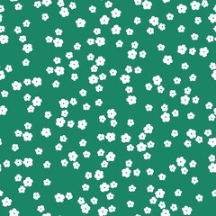 Seamless vintage pattern. Small white flowers . green background. vector texture. fashionable print for textiles, wallpaper and packaging.