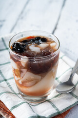 a glass of homemade gourmet cold strawberry taho 