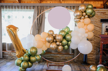 Photo zone decoration from balloons on a baby party