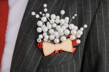 man buttonhole with a wood bow with copy space for your text..