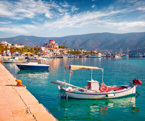 Captivating summer cityscape of Kilada port with old fishing boat. Astonishing morning scene of...