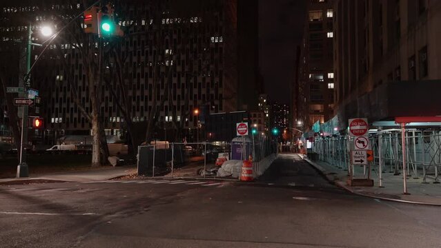 Closed Road in NYC. North Street construction site at Night in Downtown Manhattan. Blinking Lights and Empty Roads