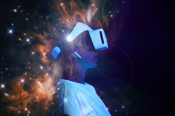 Obraz na płótnie Canvas Woman is using virtual reality headset. Elements of this image furnished by NASA.