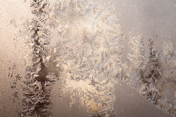 Ice flowers on a window on a winter morning