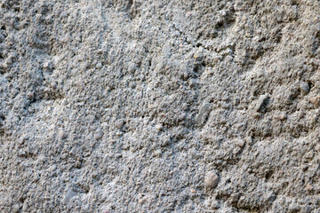 Gray cement texture of a building or structure, background.