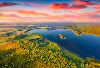 Exciting sunset on Krymne Lake. Superb view from flying drone of Shatsky National Park, Volyn...