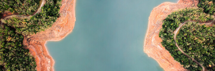 panoramic top view of a river in the forest