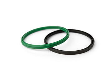 Green and black rubber gasket ring isolated on white background.