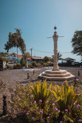 A monument in the main square of Velha, a suburb of Praia on Cabo Verde islands on a warm sunny...