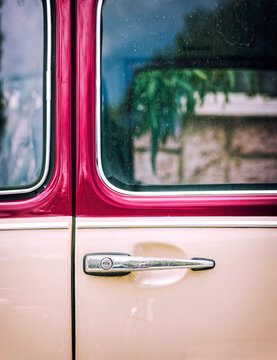 classic sixties car shiny handle and  bi-colored door, space for your text