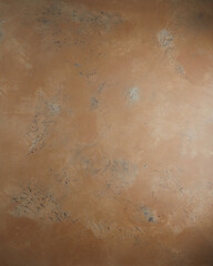 Light rust textured background. Copy space.