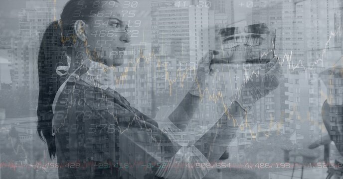 Composite image of financial data processing against caucasian female doctor examining an x-ray - Powered by Adobe