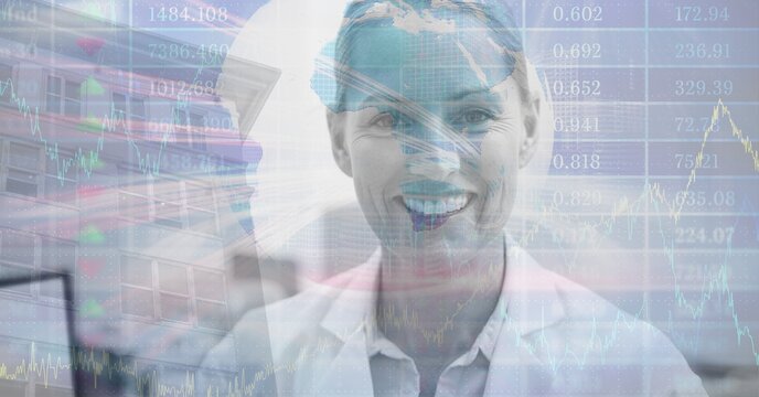Composite image of financial data processing against against caucasian female doctor smiling