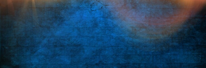 Spots of light over blue brick wall background with copy space