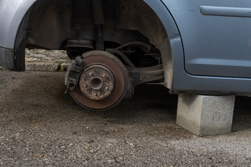 Blue car in a state of abandonment
