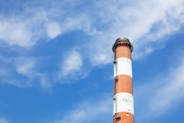 Stack chimney of the electric plant. in the picture, there is an elevator way and an elevator used...