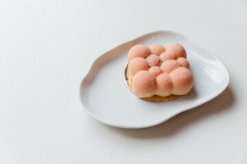 Appetizing dessert in the form of bubbles, pink