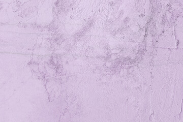 Concrete wall cement background with abstract paint pink light purple lilac rough texture