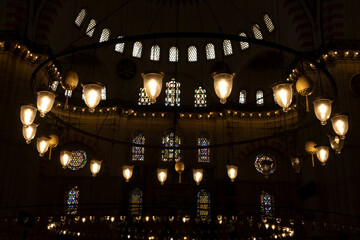 Obraz premium Suleymaniye Mosque chandeliers and windows. Selective Focus On Chandeliers.