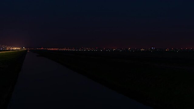 Time Lapse of planes landing in Amsterdam Schiphol Airport at night
